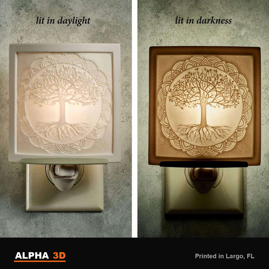 Black and white tree of life lithophane night light, lit in daylight and glowing in the dark